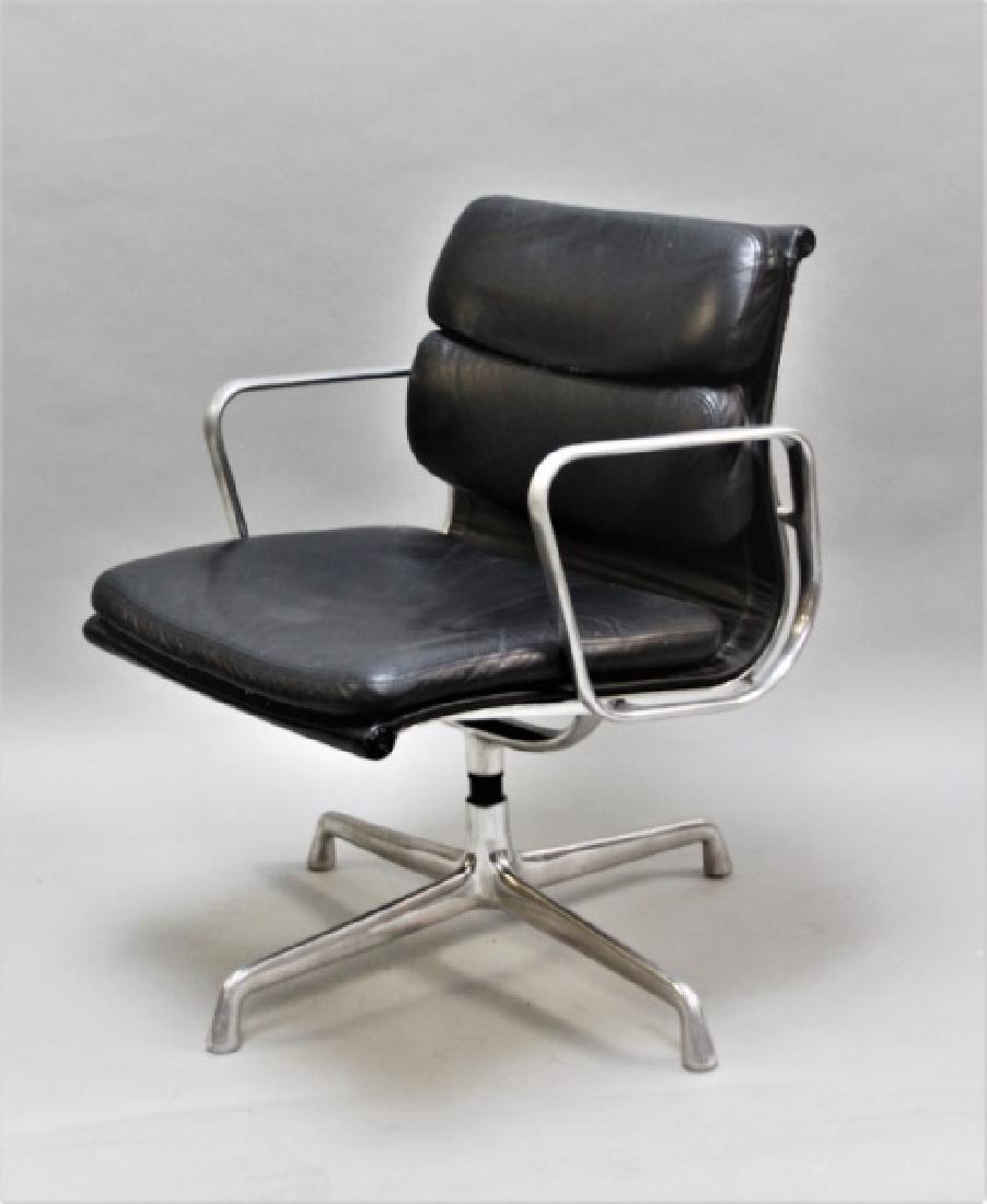 Eames "Soft Pad" Chair by Herman Miller USA: Vintage Charles and Ray Eames "Soft Pad" chair by Herman Miller USA. Cast aluminum with leather upholstery. Very good condition (needs foot pads). Measures 23" x 23" x 33.5".