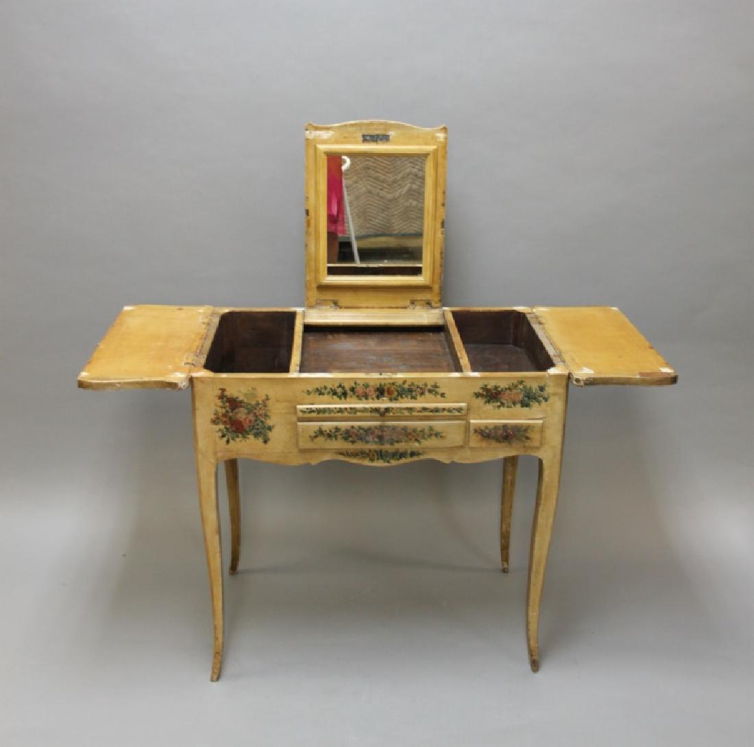 Louis XIV French Country Petit Hand Painted Vanity: Louis XIV French Country petit vanity, hand painted with floral motif and images of a garden and lovers. Vanity has a pull out tray and a hinged top that opens to reveal a mirror underside and 3 inner
