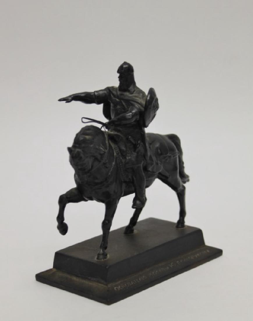 Soviet Era Cast Iron Sculpture Yuri Dolgoruky: Soviet era cast iron sculpture depicting Yuri Dolgoruky sitting on a horse wearing helmet and armor, pointing to where the future Kremlin must be built. Made of cast iron with black enamel finish. Mar