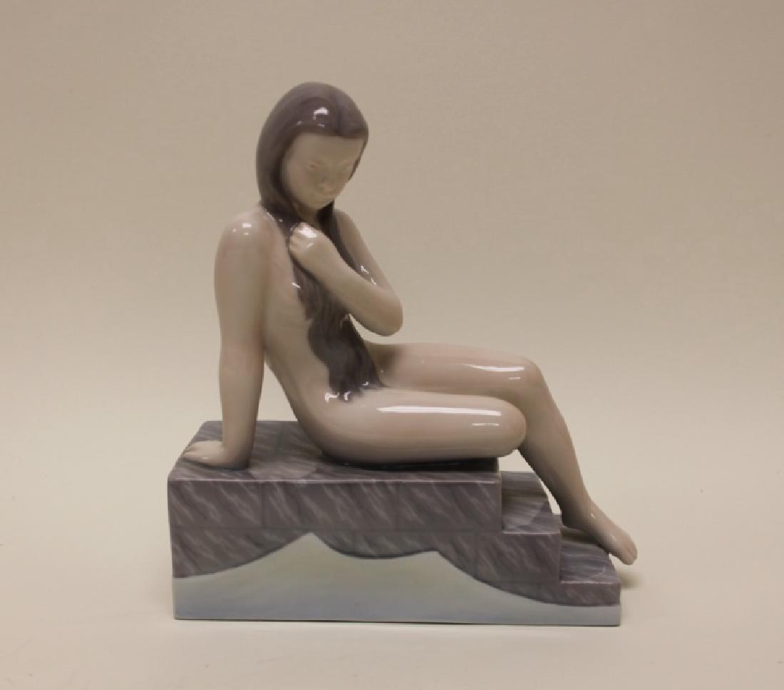Copenhagen, B & G, Denmark Porcelain Nude on Steps: Rare, retired Copenhagen, Bing and Grondahl, Denmark porcelain figure "Nude Girl on Steps" by Vend Jespersen and Ebbe Sadolin. Number 2302 (discontinued). Excellent condition. Measures 7.25" x 4" x 8.