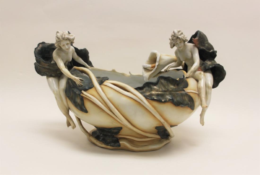German Art Nouveau Centerpiece Nudes & Lily Pond: Antique German Art Nouveau porcelain centerpiece bowl in the Teplitz and Amphora style. Bowl is sculpted as a figural pond surrounded by lilies and two nude women. Very good condition, minor loss & re