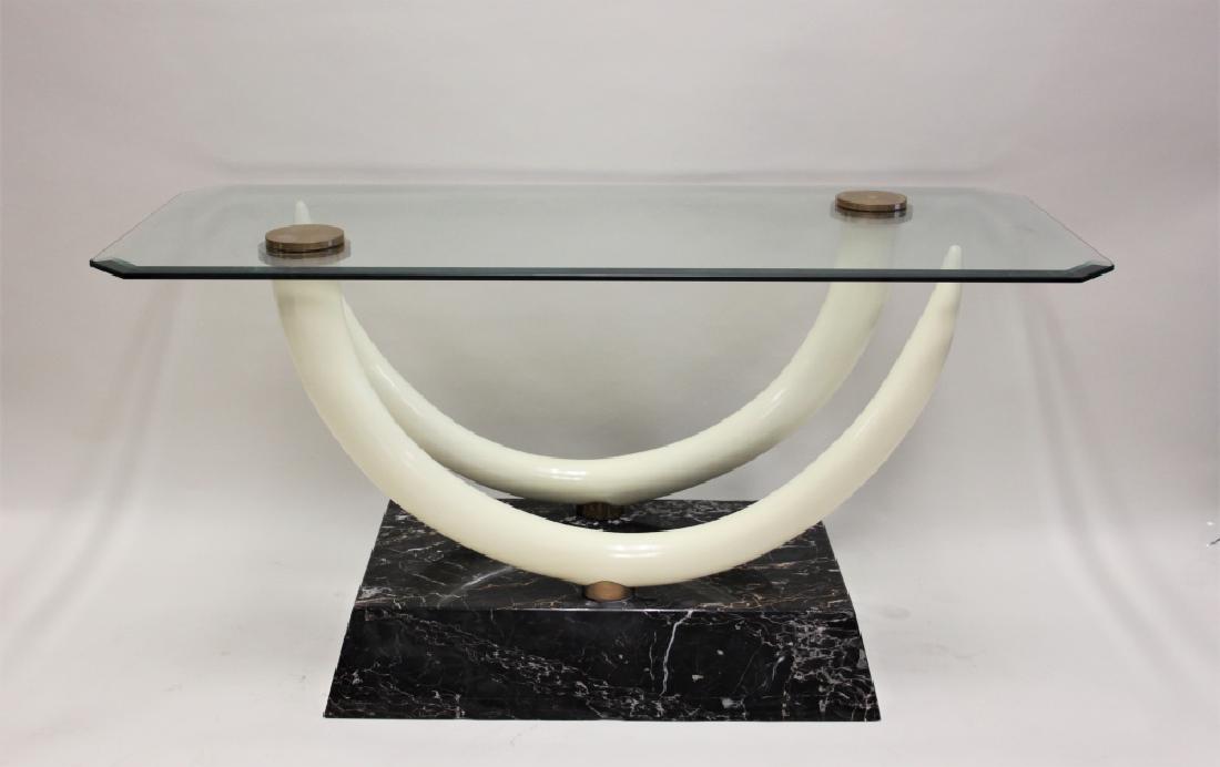 Hollywood Regency Elephant Tusk Hall Console Table: Faux Elephant tusk console or sofa table attributed to Maison Jansen for Ralph Pucci. Glass top table is drilled and secured with brass retainers. Excellent condition, (tusk paint has minor wear, see