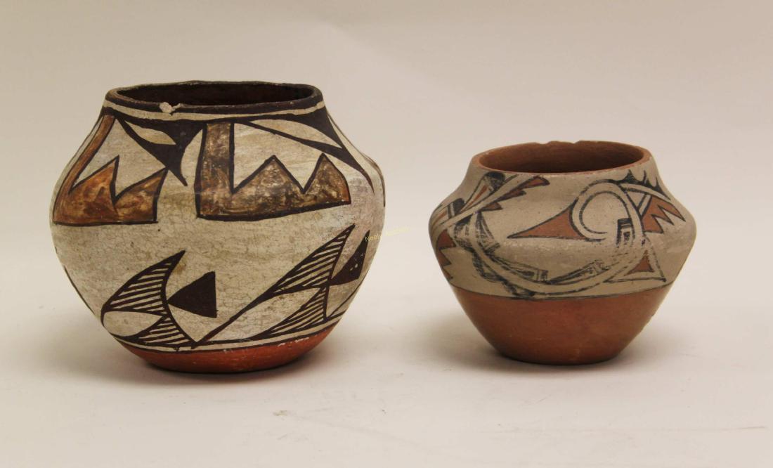 (2) Jemez New Mexico Hopi Indian Pottery Bowls: (2) Jemez, New Mexico Hopi Indian pottery bowls. Very good condition, (rim chips, see photo). Measure 6" dia x 5" and 5" dia x 3.5".