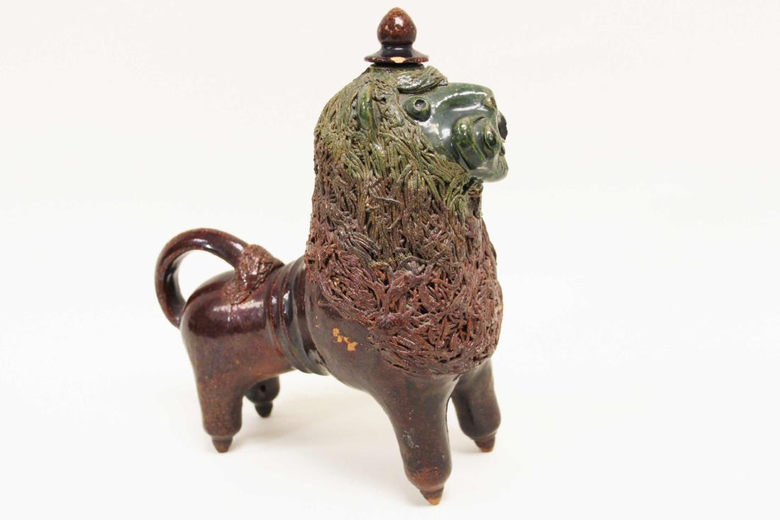 19c Continental Red Ware Pottery Lion Aquamanile: 19th Century Continental Red Ware "Standing Lion" figural Aquamanile or tabletop hand washing vessel. Unusual brown and green glazed pottery lion has a Palissy ware style mane and a top knot stopper. 