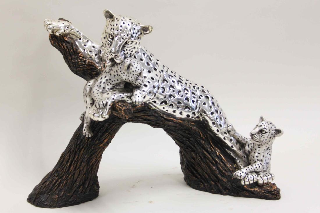 D'Argento Sculpture Leopards Family Mother w Cubs: D'Argento Sculpture, "Leopards Family". Mother leopard reclining on a branch with her two cubs. Signed "D'Argento, Mexico" and numbered 412 / 500. Excellent condition. Measures 29" x 16" x 22".