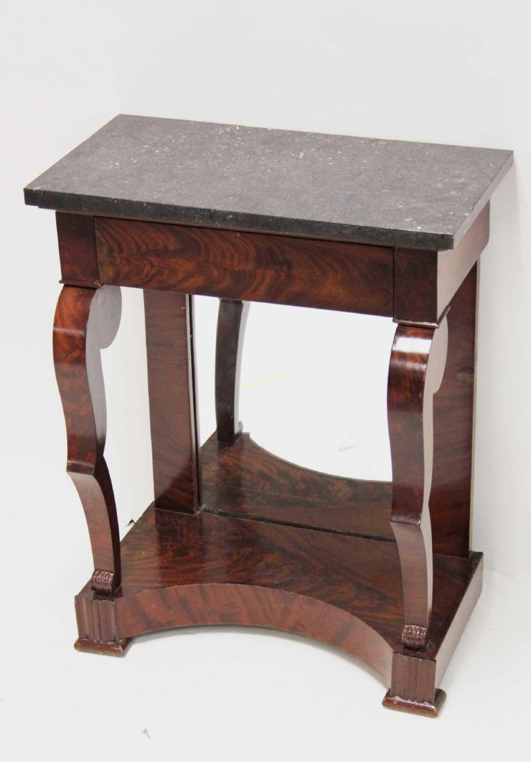 19c Empire Single Drawer Hall Table w Marble Top: 19th Century Empire single drawer mahogany hall table with a marble top. Built with dove tail construction, a mirrored base and scroll bracket. Excellent condition. Measures 24" x 12.5" x 30".