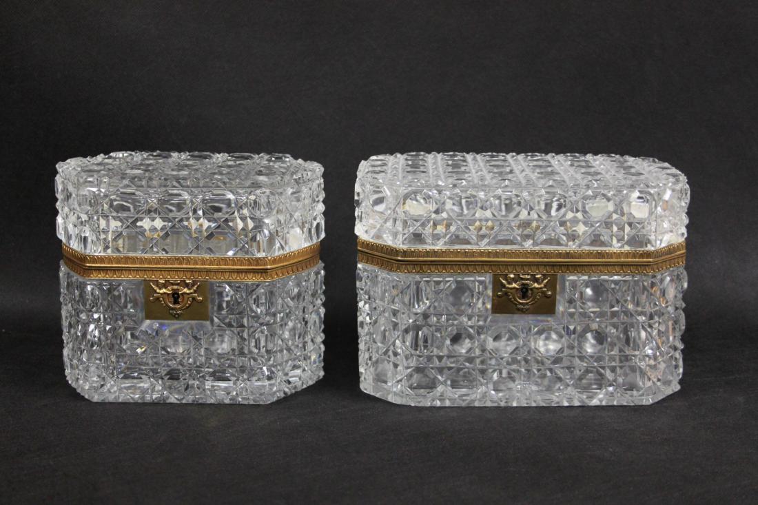 (2) Large Cut Crystal & Dore Bronze Dresser Boxes: (2) Large Waterford attr. cut crystal and ormolu bronze dresser boxes. Excellent condition (no keys). Large box measures 8" x 5" x 5.5". Medium box measures 7" x 4.5" x 5.5".