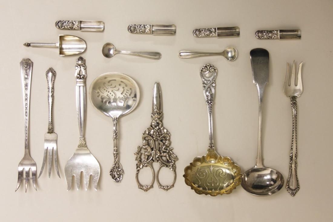 (15) Sterling Serving Forks, Ladles & Grape Shears: (15) Pieces of sterling silver serving utensils include: (4) Serving forks, (3) Ladles (one coin silver), (7) Salt spoons and (1) Pair of grape shears. Excellent condition. Total weight = 8.5 troy oz.