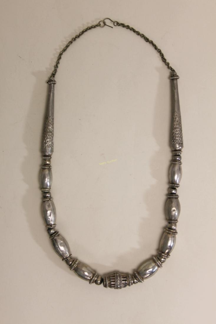 Vintage North African Tribal Silver Necklace: Antique North African Tribal sterling silver, hand wrought beaded necklace. Measures 27". Weight = 3.5 troy oz. ***All silver, gold and jewelry purchases must be verified to prevent fraud. Please be p
