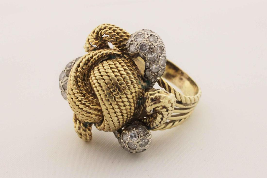 Vintage 14k Gold & Diamond Rope Cut Cocktail Ring: Vintage 14k gold and Melee diamond cocktail ring. Rope cut center knot design with approx, 0.8 carats of single cut Melee diamonds set in three gold scrolls. Size 9. Measures 1.15". Weight = 20.3 g, o