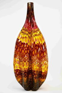 Stephen Powell (American 1951-2019) Reptilian Vase: Stephen Powell (American, 1951-2019) blown art glass sculptural vessel or giant bottle. Large colorful reptilian blown art glass sculptural vase. Ribbed and variegated colored glass composition in a