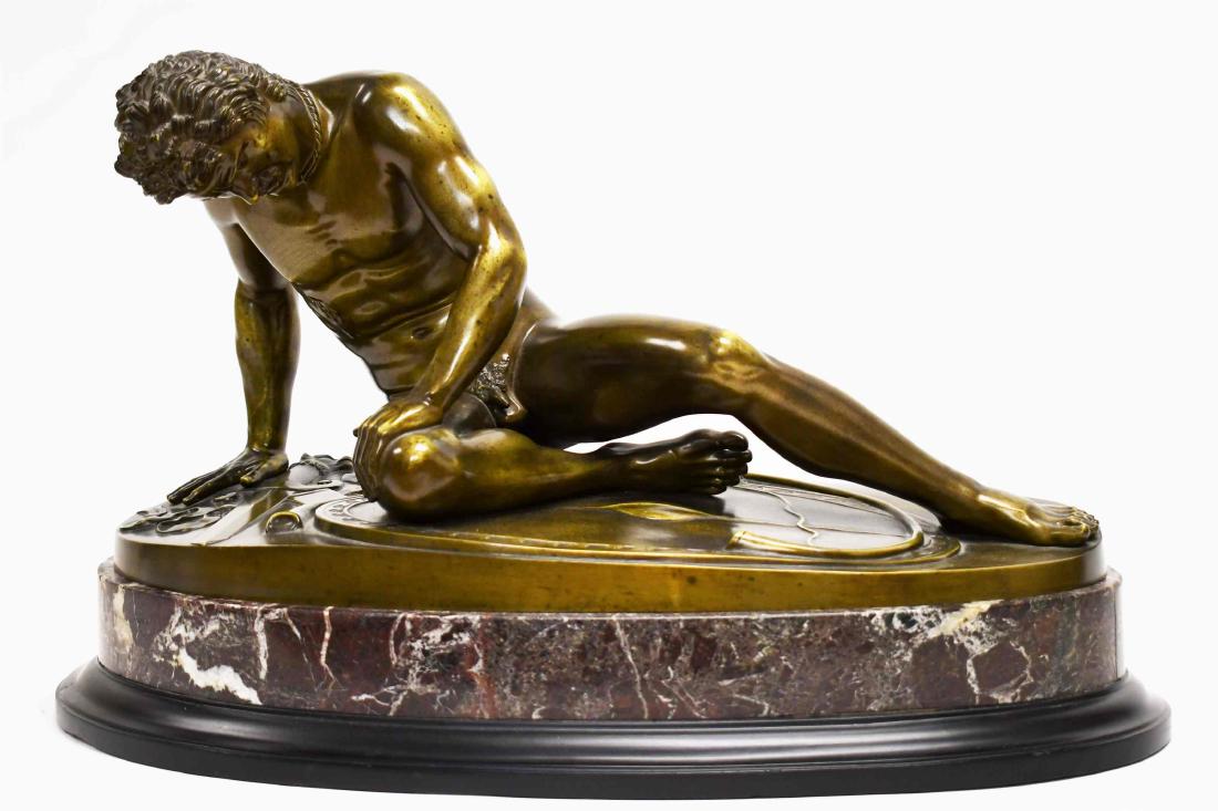 Pietro Chiapparelli Bronze 'The Dying Gaul': Pietro Chiapparelli (Italian 19/20 Century). Large bronze sculpture of a nude Gladiator seated on his shield. Reclining figure is mounted on a slate and marble plinth, signed en verso "Po Chiapparelli