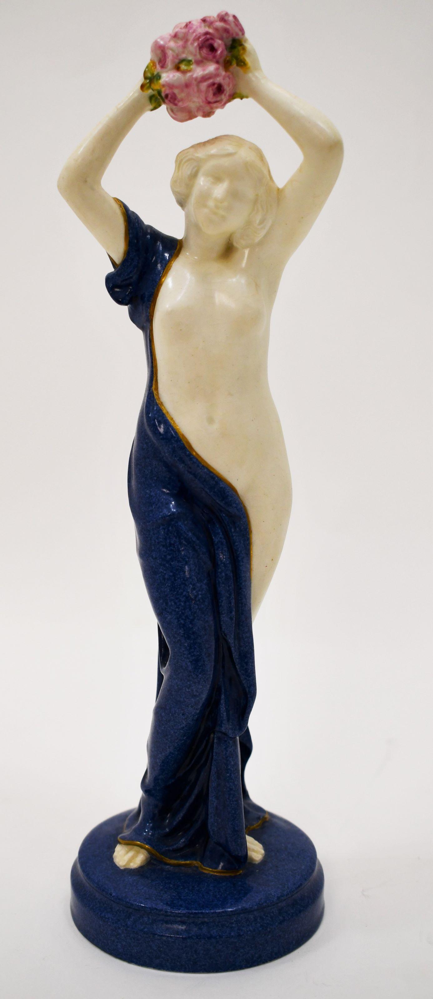Royal Worcester Crown Ware Nude Female Figure: Royal Worcester Crown Ware nude figure with bouquet. Excellent condition, (crackle to clear glaze. Measures 3.25" dia x 11".