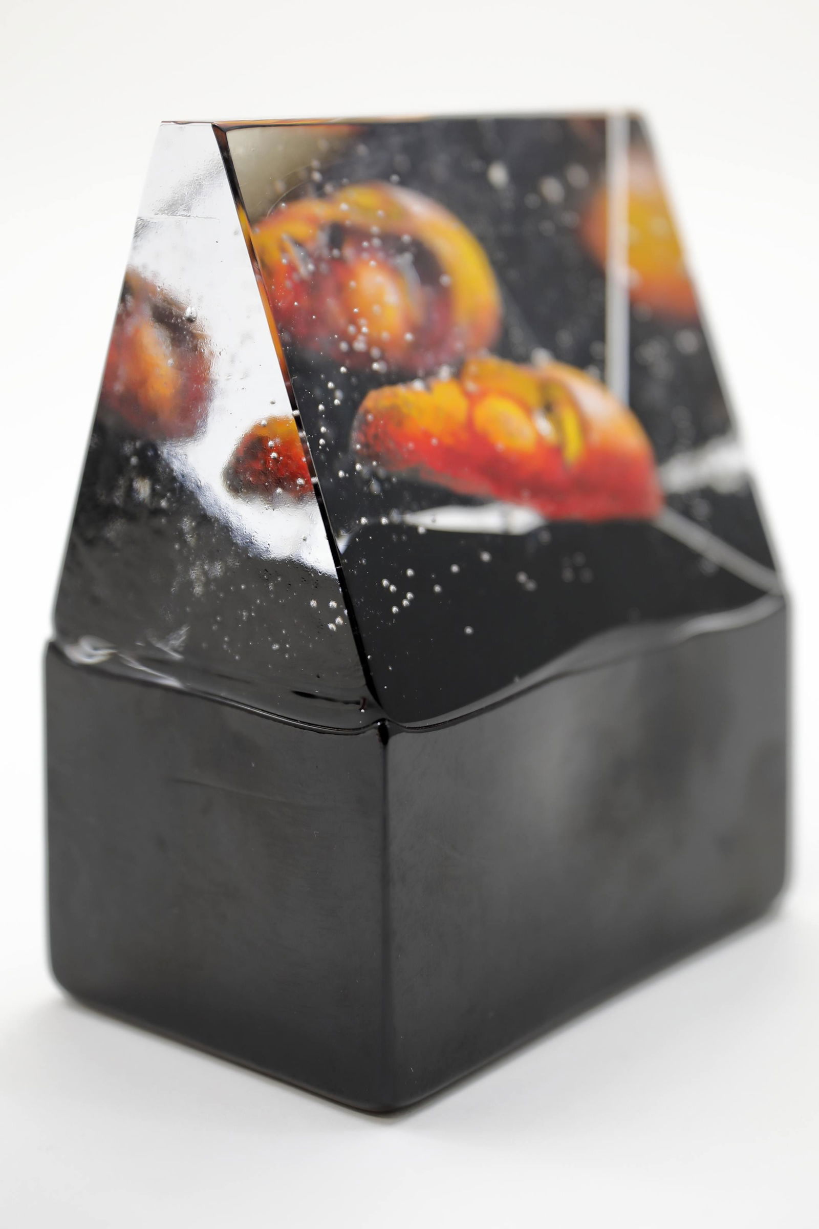 Bertil Vallien for Kosta Boda Glass Face Sculpture: Bertil Vallien for Kosta Boda glass sculpture. Two tone glass with an internal image of a face. Excellent condition. Measures 5" x 3.25" x 6.25".