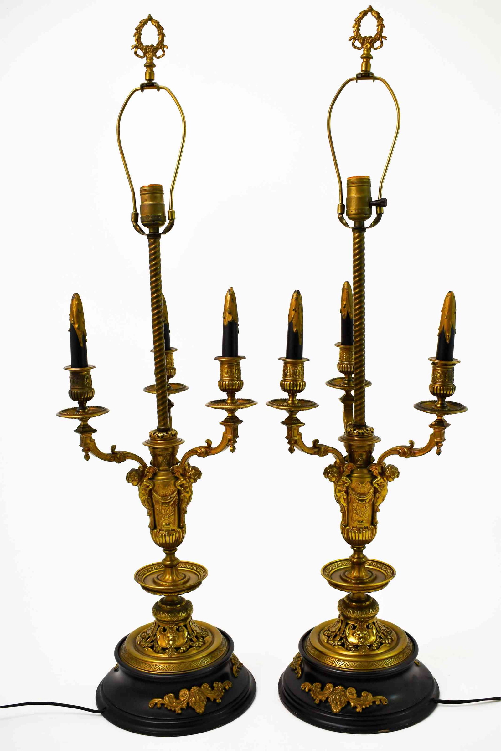 Pair Antique Edwardian 4- Light Candelabra / Lamps: Pair large antique bronze three light candelabra now mounted as lamps. Excellent condition. Measure 11" dia x 28" to switch.
