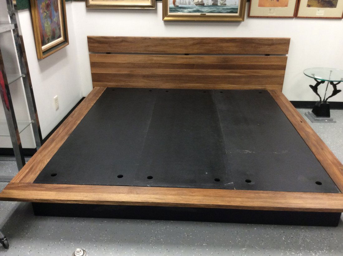 Industrial Style Wood King Size Platform Bed: Industrial / minimalist Ralph Lauren style exotic wood planked king size platform bed with wrap around plank deck. Excellent condition. Measures 88" x 92" x 10".