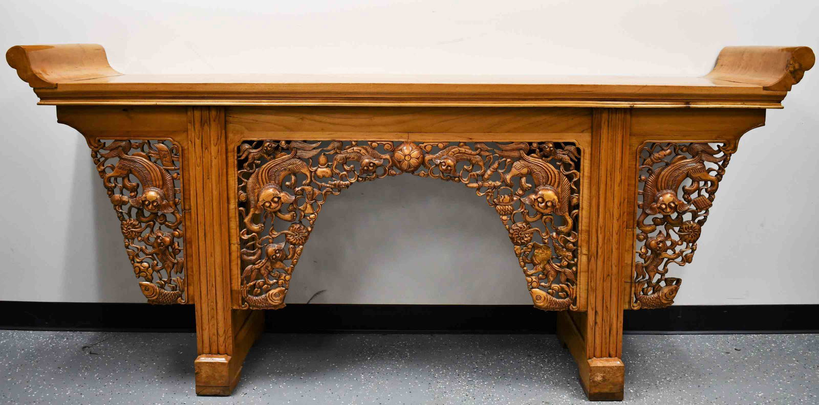 Vintage Oriental Alter Table w Fish, Shishi Lions: Vintage Oriental alter table. Solid wood table with fretwork carved aprons decorated with Asian carp and Shishi lions. Excellent condition, (minor loss, see photo). Measures 84" x 21" x 38.5".