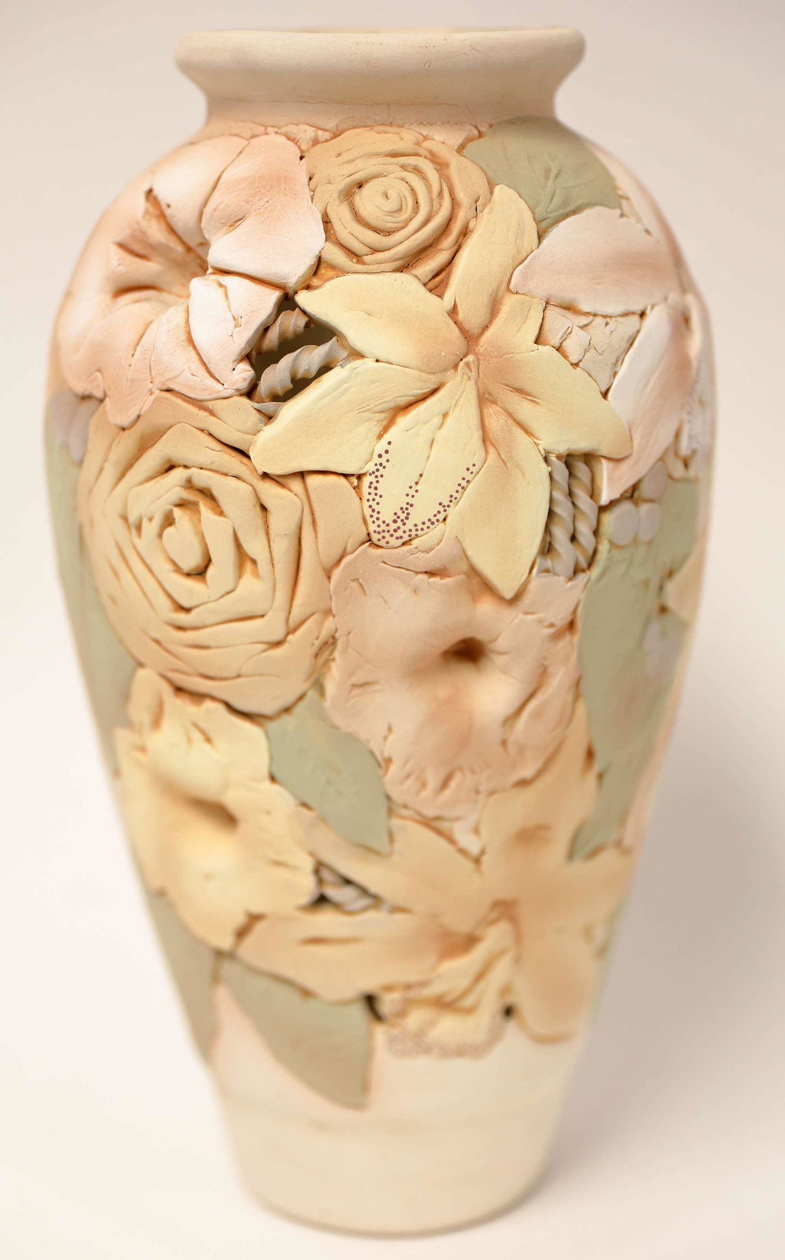 John Davis Repousse Pottery Rose Vase: John Davis repousse pottery rose vase. Excellent condition. Measures 7" dia x 14".
