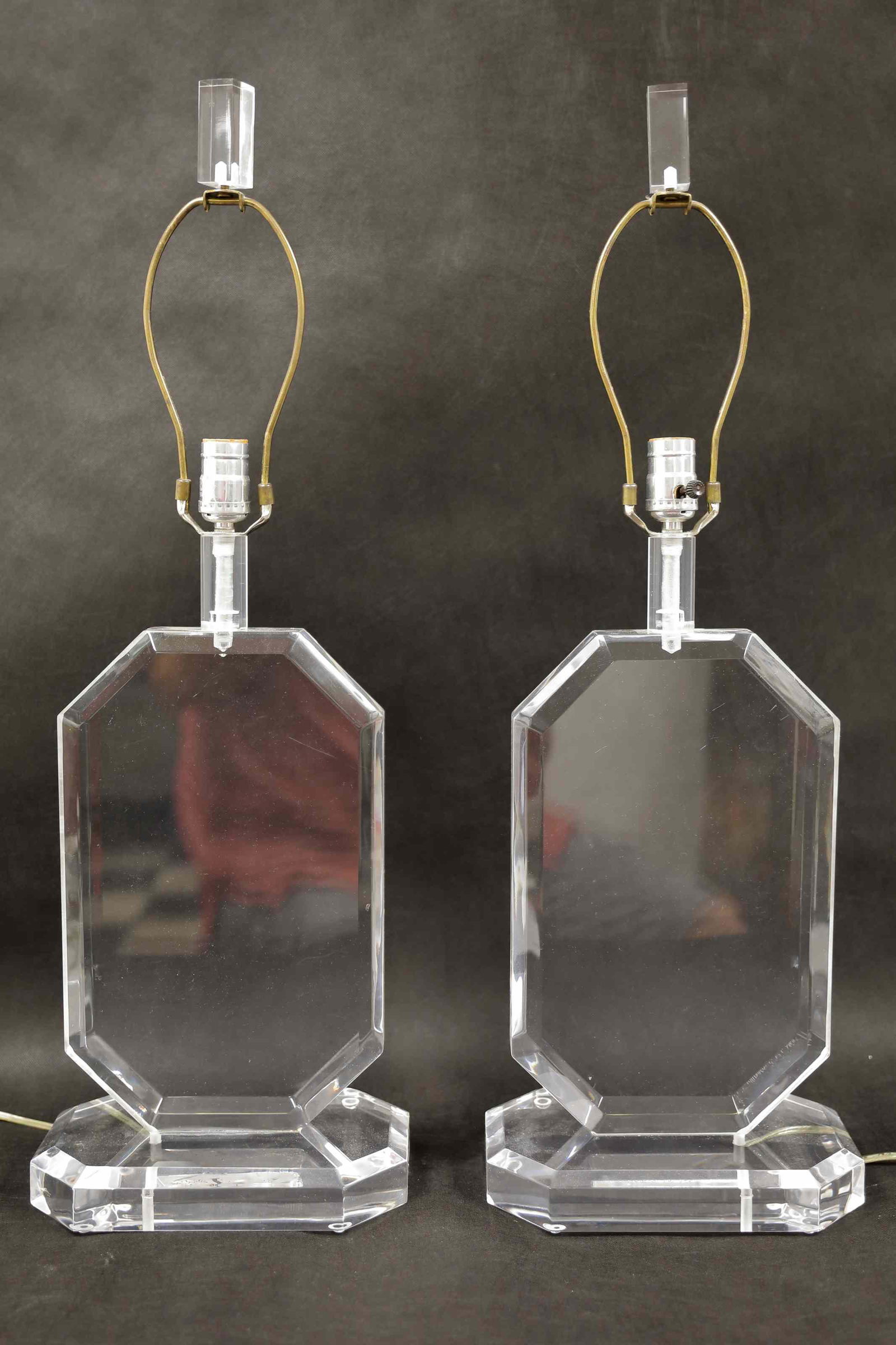 Pr Karl Springer Lozenge Form Lucite Table Lamps: Pair vintage Karl Springer lozenge form Lucite table lamps. Excellent condition. Measure 10.5" x 7" x 20" to switch.