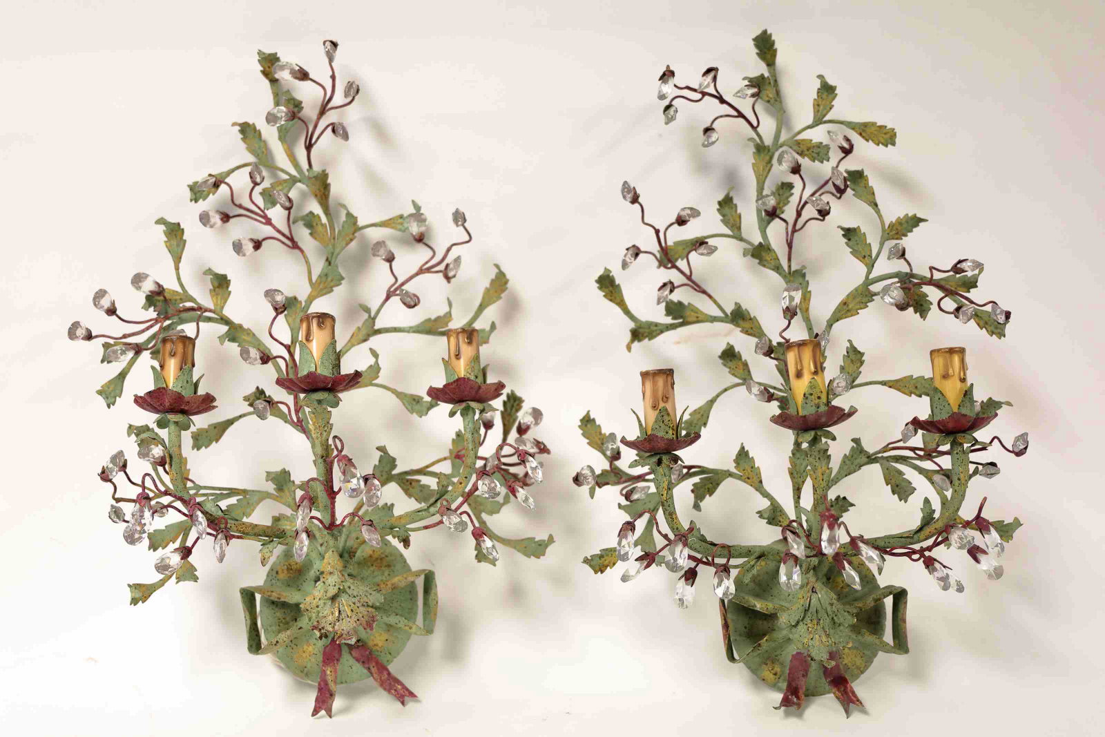 Pr Italian Floral Painted Iron & Crystal Sconces: Pair of vintage Italian floral painted wrought iron and cut crystal decorated three light sconces. Excellent condition. Measure 16" x 8" x 24".