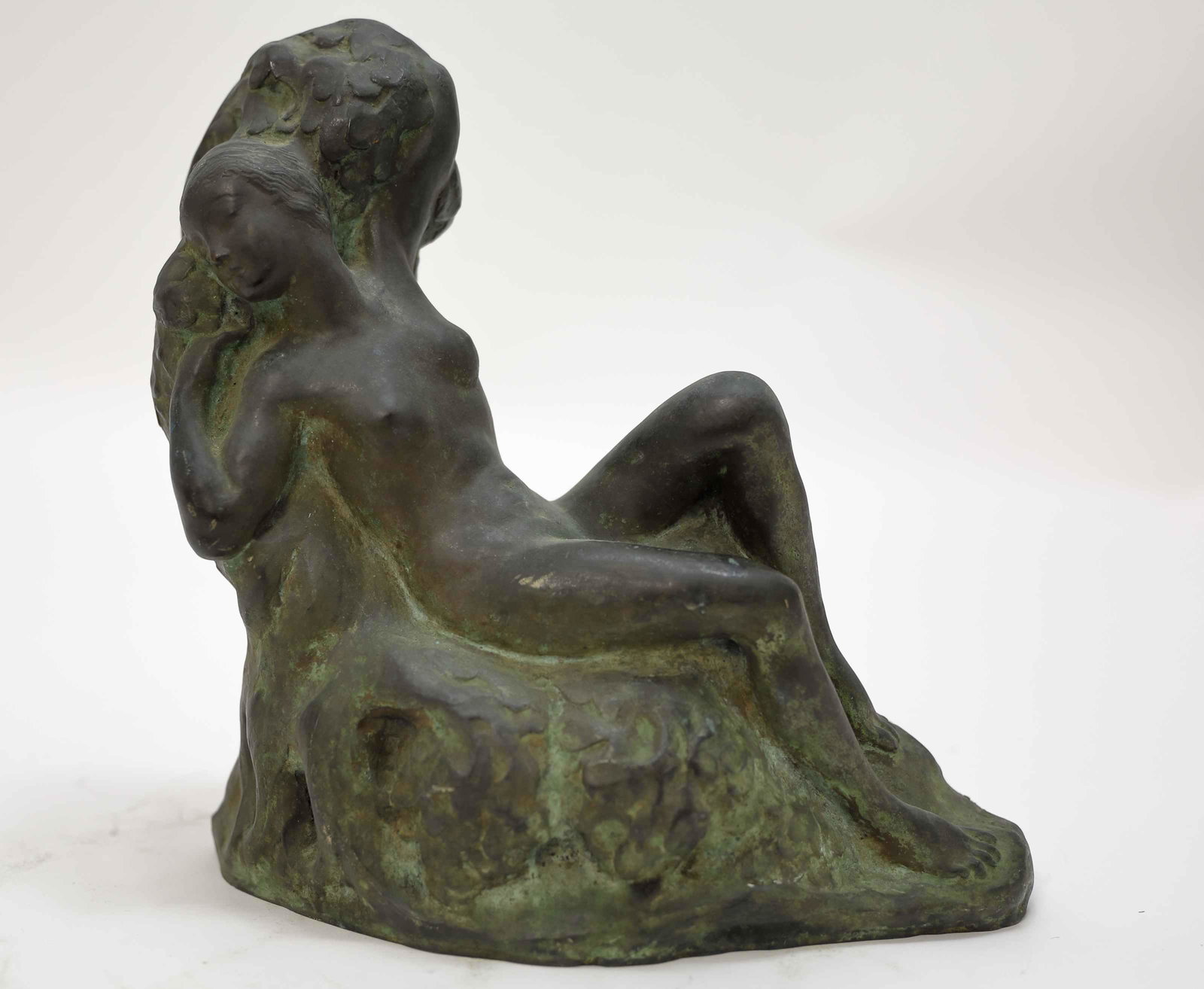 Harold Perry Erskine American 1879-1951 Nude Woman: Harold Perry Erskine (American, 1879-1951) Bronze sculpture of a reclining nude woman, signed Erskine. Excellent condition, with patina. Measures 12" x 5" x 11".
