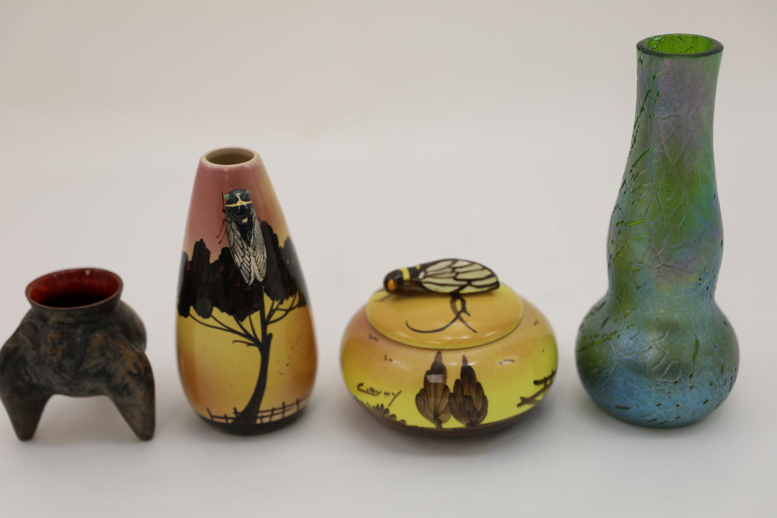 (4)pc Piccard, Pottery & Austrian Art Glass Group: (4) Piece Pottery & Art Glass grouping. Kralik Austrian art glass vase. Measures 3.5" dia x 8.5" tall. (2) Piece French Cicada ceramic, vase and covered dish. Both have mounted Cicadas and bowl lid se