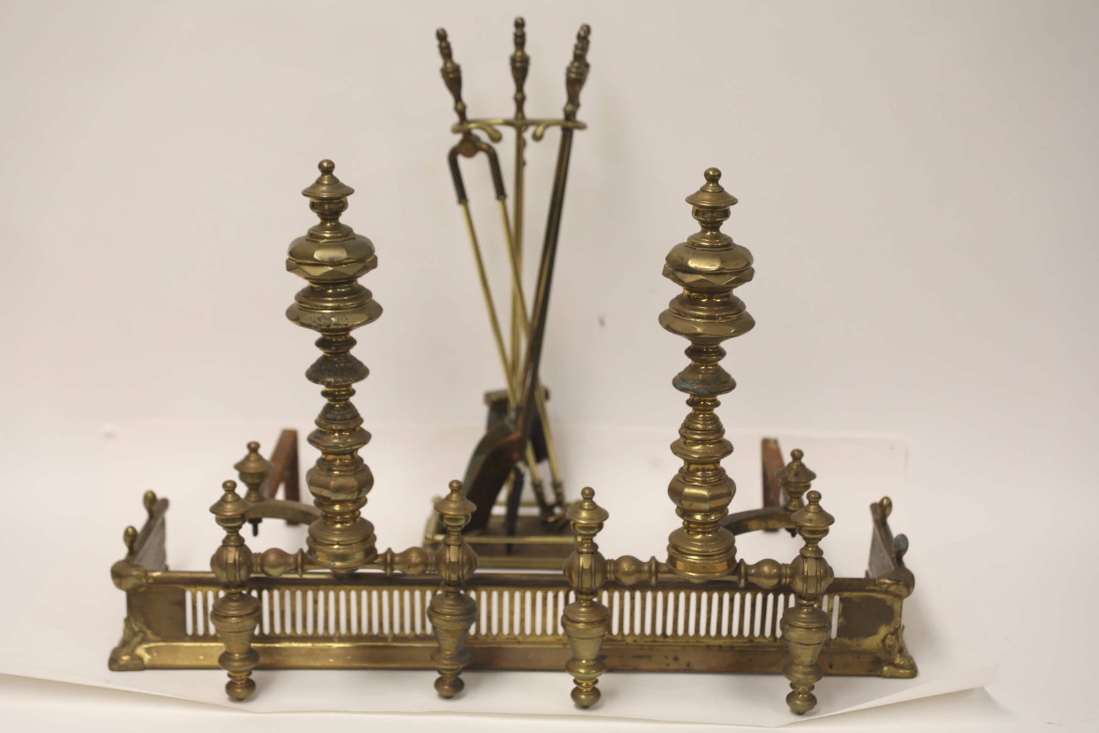 3pc Chippendale Fireplace Tools Andirons & Fender: (3) Piece Brass Chippendale fireplace set. Fireplace tools measures 9" x 6.5" x 28.5". (2) Large Andirons measure 24" x 25" and Fender measures 38" x 11" x 5". Excellent condition.