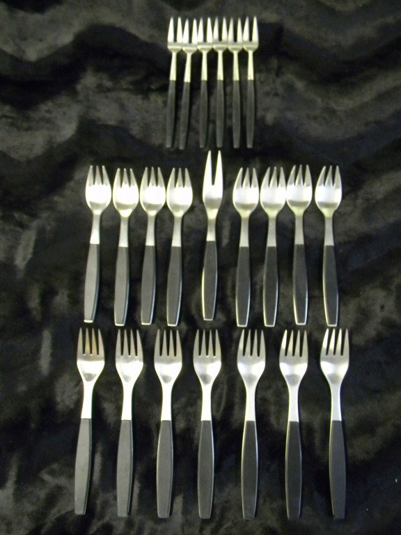 George Jensen Stainless flatware set: George Jensen full service for 6 (6-pc place settings)+PLUS EXTRAS. as listed. Stainless steel with black composite handles. 45 pieces total: 7 dinner forks, 8 salad forks, 6 coctail/seafood forks, 6 