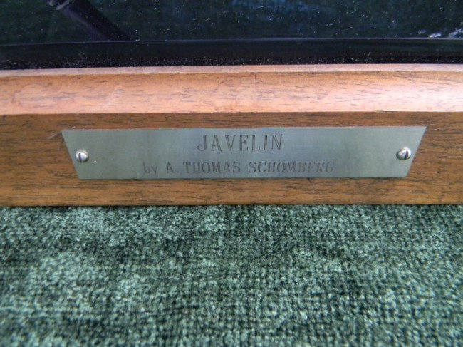 Bronze sculpture by Thomas Schomberg: Bronze sculpture of a javelin thrower on a terazzo and wood base. Thomas Schomberg. 23"x 23" tall