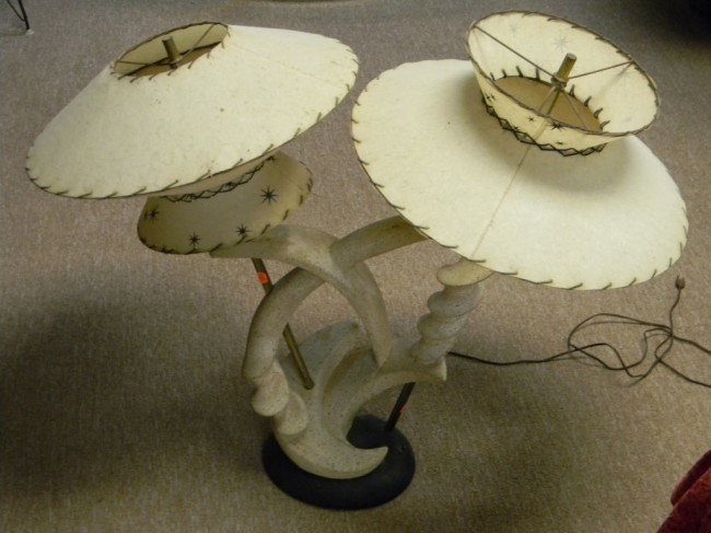 MId century lamp: Painted plaster 2-fixtued lamp with fiber shades in original condition. 40" x 32" x 20".