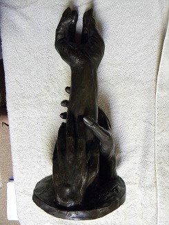 Stan Sawyer bronze patina-ed sculpture. '71: Stan Sawyer bronze patina-ed sculpture of hands. '71. 7.5" x 16" x 7"