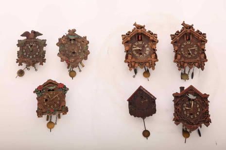 7 Vintage Coo Coo Clocks SiroccoWood Lux & Keebler: (7) Vintage miniature coo coo clocks made from sirocco wood by Lux & Keebler. (4) Lux, three of which are Automatons and two are identical topped with quails. The fourth is carved in the shape of a