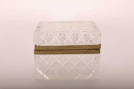 Cut Crystal Lidded Dresser Box w Bronze Dore Edge: Vintage cut crystal lidded and hinged dresser box with bronze dore mounts. Very good condition, some flea bites to base and edges. Measures 4" x 2.5" x 3.25".