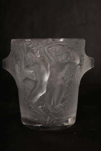 Lalique France Crystal "Ganymede" Champagne Cooler: Lalique France frosted crystal "Ganymede" champagne cooler. Champagne bucket features side handles and a bas relief of two pairs of contorted nude females and an acanthus motif. Excellent condition.