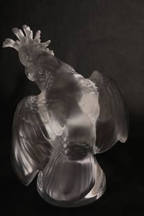 Large Lalique France Crystal "Cockatoo" Sculpture: Large Lalique France frosted and clear crystal "Cockatoo" sculpture. The bird spreads his wings in an angular pose as he arches his neck backward to see what is behind. Signed "Lalique France" on