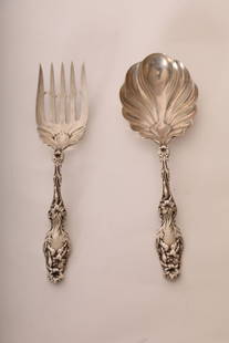 (2) Piece Sterling Whiting Lilly Salad Servers: (2) Piece sterling Whiting manufacturing Company salad servers in Lilly pattern marked sterling. Weighs 8.42 troy oz.