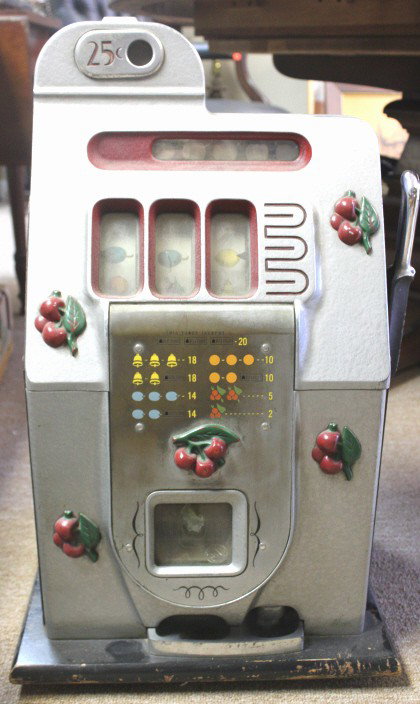 Quarter Slot Machine: 16" x 26" x 15" Style/Time Period: Early 20th century