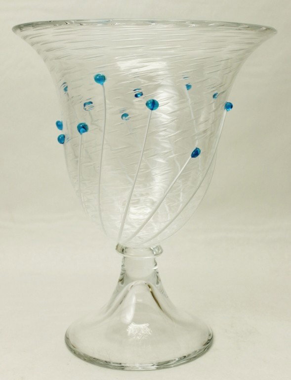 Licio Zanetti Tulip-Style Art Glass Vase: Tulip-style Murano art glass pedestal vase by Italian artist Licio Zanetti. Vase is decorated with vertical, swirling white stems and royal blue beaded buds. Signed, "Zanetti L." Dimensions: 13 1/4"D 