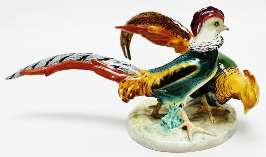 Richard Ginori Italy Majolica Game Cocks: Richard Ginori Italy porcelain majolica figure depicting 2 game cocks. Very minor losses to paint on head and tailfeather, as shown. Dimensions: 12' x 6 1/4" x 9" Style/Time Period: MId-century Artist