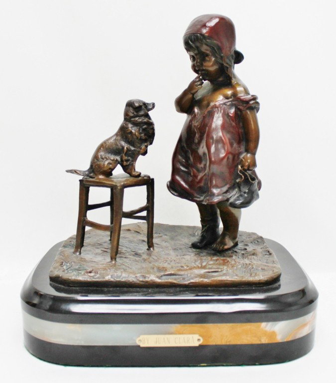 Juan Clara Bronze Sculpture. Girl w/ Dog: Bronze sculpture of a girl with her dog by artist Juan Clara (Spainish, 1875-1957) Dimensions: 10" x 11" x 8" Style/Time Period: 20th Century Artists: Juan Clara