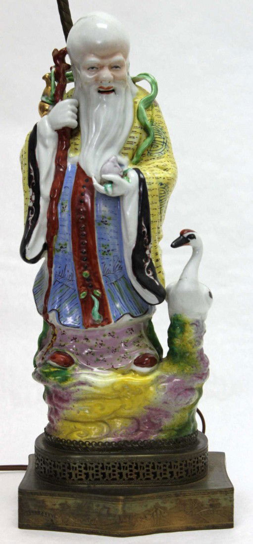 Hand-Painted Chinese Porcelain Buddha Lamp: Hand painted Chinese porcelain sculpture depicting a Buddha with duck. Mounted as a lamp without damage to figurine. Base measures 7" x 2 1/2" x 6". Figure measures 6" x 14" x 4" Dimensions: 6" x 14"
