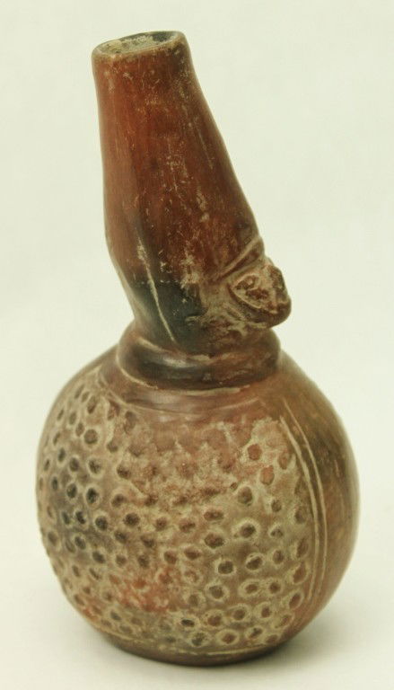 Pre-Columbian Vessel. Chimu, Peru 900-1100 AD: Pre- Columbian figural vessel depicting a Warrior. Chimu, Peru. 900-1100 AD Dimensions: 3" x 6 1/2" x 3 1/2" Style/Time Period: Pre-Columbian