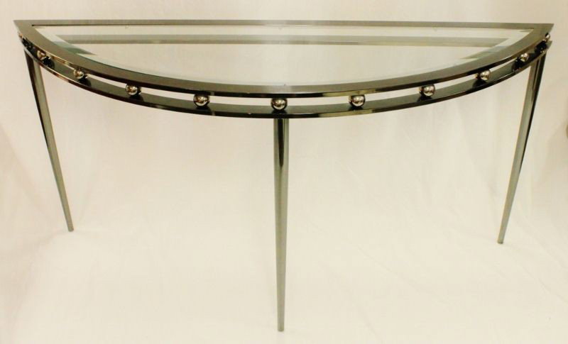 Polished Steel and Glass Console Table Germany: Demiloom polished steel and glass console/sofa table. Designed and imported from Germany Measurements: 60" x 29" x 17" Year/Era: Modern