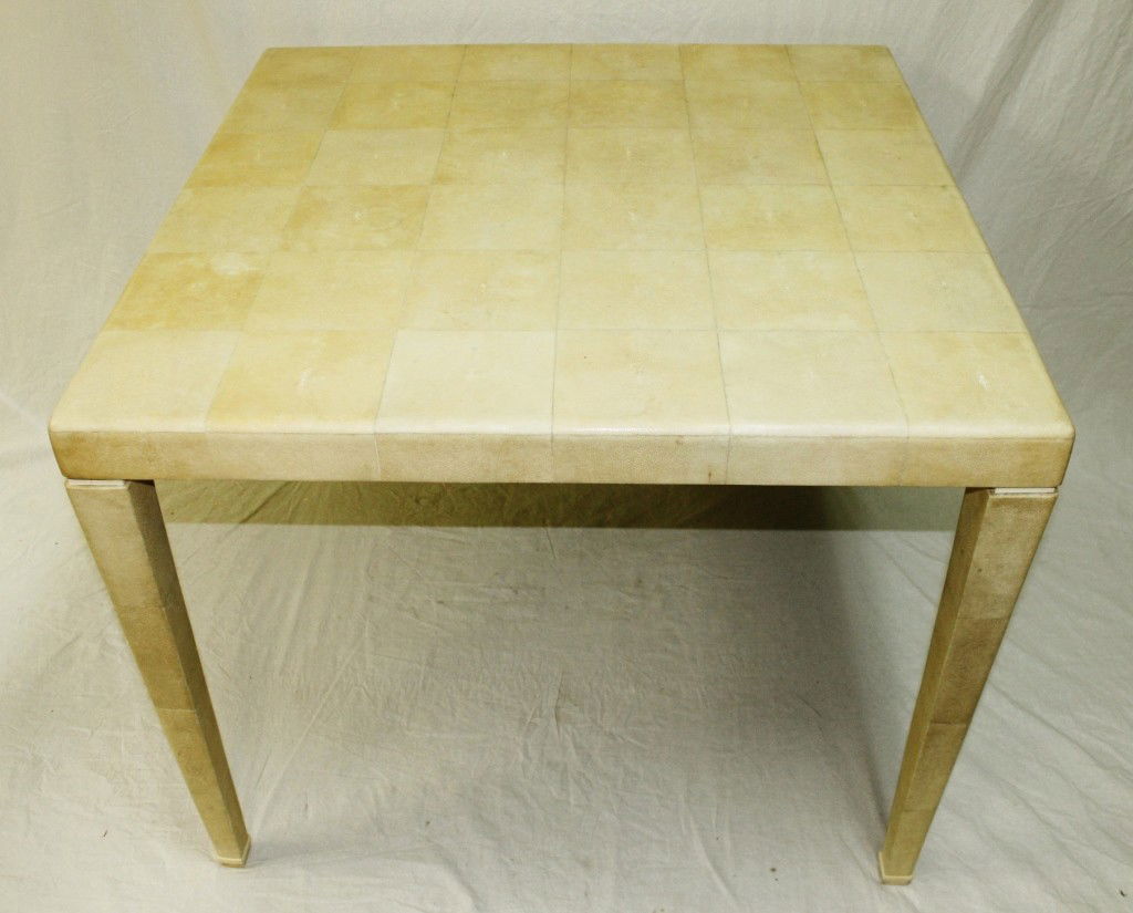 Karl Springer Sharkskin Game Table: Karl Springer Sharkskin Game Table with Bone Inlay. Underside of table has been covered with felt (previous owner was snagging her nylons!). (2) bone inlay pieces missing at bottom of one leg. No stai