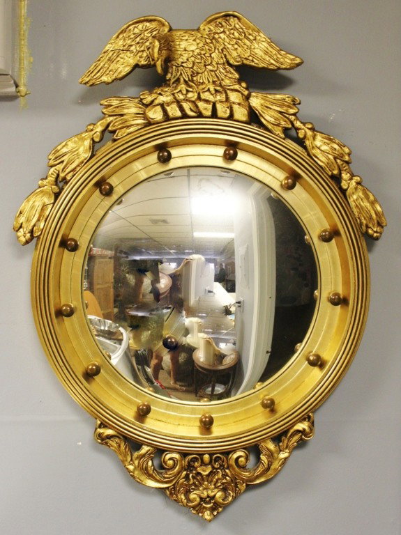 Gilt Wood Federal Style Bullseye Eagle Mirror: Italian carved gilt wood federal syle bullsey eagle mirror. Measurements: 26" x 35.5" x 2.5" Year/Era: Mid Century