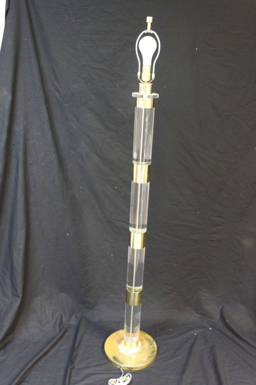 Karl Springer Acrylic + Brass Floor Lamp: Karl Springer Acrylic + Brass Floor Lamp. Unsigned, With Minor Surface Oxidation On Brass Base. Measurements: 11" diameter base x 62" tall Artist: Karl Springer
