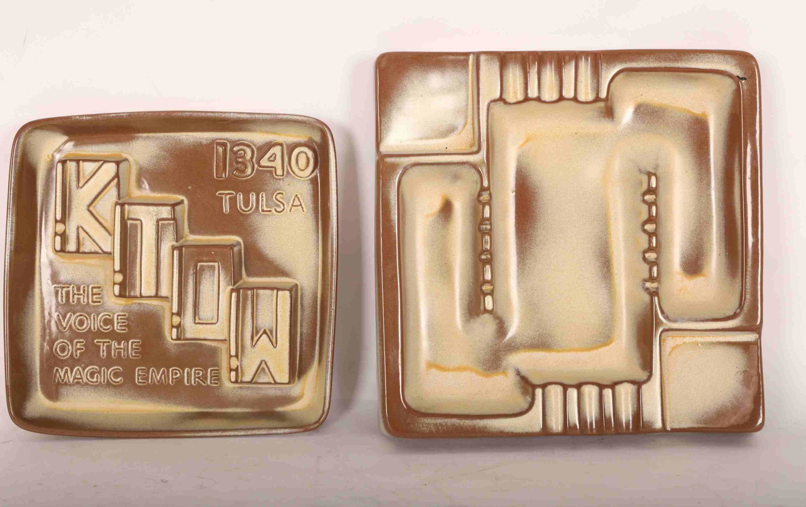 Pr Frankoma Ashtrays: Bas Relief & Magic Empire: Pair of vintage Frankoma ashtrays: (1) advertising ashtray with bas relief KTOW 1340 Tulsa, The Voice Of The Magic Empire, (1) square #464. Excellent condition. Largest measures 10.5" square. Smallest