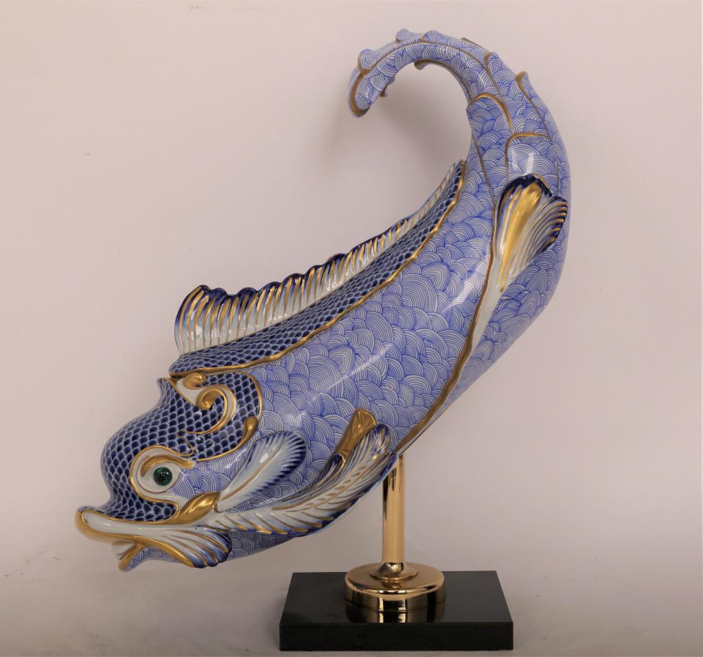 Lg Giulia Mangani for Oggetti Porcelain Dolphin: Giulia Mangani for Oggetti Italian hand painted porcelain dolphin with gold gilt finishes on dore bronze stand and black plinth. Signed and monogrammed by artist. Includes made in Italy and Oggetti st