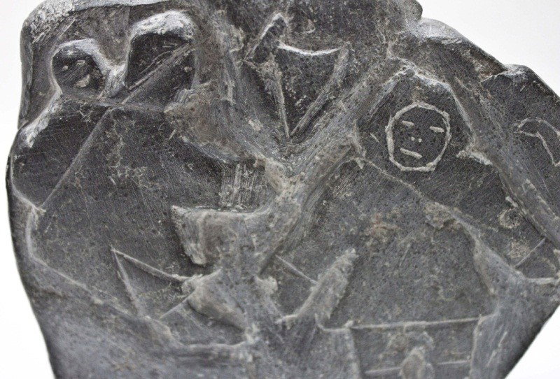 Inuit Eskimo Soapstone Carving: Inuit Soapstone Carving Depicting A Family On One Side, Hunter With Seal On The Other Side And Ancestral Carvings Along The Edges. 7 1/2" X 6 1/2" X 1 1/2"