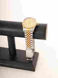 Rolex Men's Oyster Superlative Chronometer Watch: Rolex Oyster Superlative Chronometer men's self wind wristwatch with stainless steel and yellow gold band and a gold face with date and yellow gold bezel. Excellent condition (minor wear on crystal).